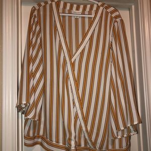 Orange and white blouse.